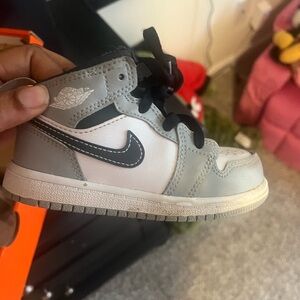 Gray and black Nike dunks toddler